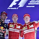 (L to R): Daniel Ricciardo (AUS) Red Bull Racing, race winner Sebastian Vettel (GER) Ferrari and Kimi Raikkonen (FIN) Ferrari celebrate on the podium at Formula One World Championship, Rd13, Singapore Grand Prix, Race, Marina Bay Street Circuit, Singapore, Sunday 20 September 2015. © Sutton Motorsport Images