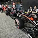 McLaren MP4-30 and team mechanics at Formula One World Championship, Rd13, Singapore Grand Prix, Preparations, Marina Bay Street Circuit, Singapore, Thursday 17 September 2015. © Sutton Motorsport Images