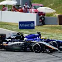 Sergio Perez (MEX) Force India VJM08 and Marcus Ericsson (SWE) Sauber C34 battle at the start of the race at Formula One World Championship, Rd5, Spanish Grand Prix Qualifying, Barcelona, Spain, Saturday 9 May 2015. © Sutton Motorsport Images