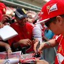 Kimi Raikkonen (FIN) Ferrari signs autographs for the fans at Formula One World Championship, Rd5, Spanish Grand Prix Preparations, Barcelona, Spain, Thursday 7 May 2015. © Sutton Motorsport Images