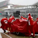 Ferrari team in the rain at Formula One World Championship, Rd16, United States  Grand Prix, Qualifying, Austin, Texas, USA, Saturday 24 October 2015. © Sutton Motorsport Images