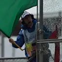 Marshal waves a green flag at Formula One World Championship, Rd16, United States  Grand Prix, Qualifying, Austin, Texas, USA, Saturday 24 October 2015. © Sutton Motorsport Images