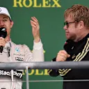 Nico Rosberg (GER) Mercedes AMG F1 celebrates on the podium with Elton John (GBR) at Formula One World Championship, Rd16, United States  Grand Prix, Race, Austin, Texas, USA, Sunday 25 October 2015. © Sutton Motorsport Images