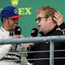 Race winner and new World Champion Lewis Hamilton (GBR) Mercedes AMG F1 celebrates on the podium with Elton John (GBR) at Formula One World Championship, Rd16, United States  Grand Prix, Race, Austin, Texas, USA, Sunday 25 October 2015. © Sutton Motorsport Images