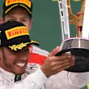 Race winner and new World Champion Lewis Hamilton (GBR) Mercedes AMG F1 celebrates on the podium with the trophy at Formula One World Championship, Rd16, United States  Grand Prix, Race, Austin, Texas, USA, Sunday 25 October 2015. © Sutton Motorsport Images