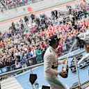 Lewis Hamilton (GBR) Mercedes AMG F1 celebrates on the podium with the cahmpagne at Formula One World Championship, Rd16, United States  Grand Prix, Race, Austin, Texas, USA, Sunday 25 October 2015. © Sutton Motorsport Images