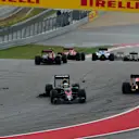 Fernando Alonso (ESP) McLaren MP4-30 and Will Stevens (GBR) Manor GP collide at the start of the race at Formula One World Championship, Rd16, United States  Grand Prix, Race, Austin, Texas, USA, Sunday 25 October 2015. © Sutton Motorsport Images