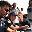 Daniel Ricciardo (AUS) Red Bull Racing and Max Verstappen (NED) Red Bull Racing at the fans autograph session at Formula One World Championship, Rd21, Abu Dhabi Grand Prix, Practice, Yas Marina Circuit, Abu Dhabi, UAE, Friday 25 November 2016. © Sutton Images