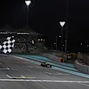 Fernando Alonso (ESP) McLaren MP4-31 takes the chequered flag at the end of Qualifying at Formula One World Championship, Rd21, Abu Dhabi Grand Prix, Qualifying, Yas Marina Circuit, Abu Dhabi, UAE, Saturday 26 November 2016. © Sutton Images