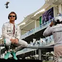 Nico Rosberg (GER) Mercedes AMG F1 and Lewis Hamilton (GBR) Mercedes AMG F1 on the drivers parade at Formula One World Championship, Rd21, Abu Dhabi Grand Prix, Race, Yas Marina Circuit, Abu Dhabi, UAE, Sunday 27 November 2016. © Sutton Images