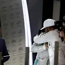 David Coulthard (GBR) Channel Four TV Commentator, World Champion Nico Rosberg (GER) Mercedes AMG F1, race winner Lewis Hamilton (GBR) Mercedes AMG F1 and Sebastian Vettel (GER) Ferrari celebrates on the podium and shake hands at Formula One World Championship, Rd21, Abu Dhabi Grand Prix, Race, Yas Marina Circuit, Abu Dhabi, UAE, Sunday 27 November 2016. © Sutton Images