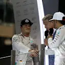 David Coulthard (GBR) Channel Four TV Commentator, World Champion Nico Rosberg (GER) Mercedes AMG F1 and race winner Lewis Hamilton (GBR) Mercedes AMG F1 celebrate on the podium and shake hands at Formula One World Championship, Rd21, Abu Dhabi Grand Prix, Race, Yas Marina Circuit, Abu Dhabi, UAE, Sunday 27 November 2016. © Sutton Images
