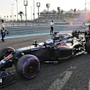 Fernando Alonso (ESP) McLaren MP4-31 on the grid at Formula One World Championship, Rd21, Abu Dhabi Grand Prix, Race, Yas Marina Circuit, Abu Dhabi, UAE, Sunday 27 November 2016. © Sutton Images