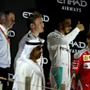 (L to R): Tony Ross (GBR) Mercedes AMG F1 Race Engineer, Nico Rosberg (GER) Mercedes AMG F1, Lewis Hamilton (GBR) Mercedes AMG F1 and Sebastian Vettel (GER) Ferrari on the podium at Formula One World Championship, Rd21, Abu Dhabi Grand Prix, Race, Yas Marina Circuit, Abu Dhabi, UAE, Sunday 27 November 2016. © Sutton Images