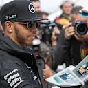 Lewis Hamilton (GBR) Mercedes AMG F1 signs autographs for the fans at Formula One World Championship, Rd1, Australian Grand Prix, Practice, Albert Park, Melbourne, Australia, Friday 18 March 2016. © Sutton Motorsport Images