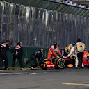 Marshals remove the car of Daniil Kvyat (RUS) Red Bull Racing RB12 after breaking down at the start of the race at Formula One World Championship, Rd1, Australian Grand Prix, Race, Albert Park, Melbourne, Australia, Sunday 20 March 2016. © Sutton Motorsport Images