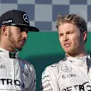 Lewis Hamilton (GBR) Mercedes AMG F1 and race winner Nico Rosberg (GER) Mercedes AMG F1 celebrate on the podium at Formula One World Championship, Rd1, Australian Grand Prix, Race, Albert Park, Melbourne, Australia, Sunday 20 March 2016. © Sutton Motorsport Images