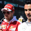 Sebastian Vettel (GER) Ferrari and Pascal Wehrlein (GER) Manor Racing on the grid at Formula One World Championship, Rd1, Australian Grand Prix, Race, Albert Park, Melbourne, Australia, Sunday 20 March 2016. © Sutton Motorsport Images