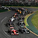 Kimi Raikkonen (FIN) Ferrari SF16-H and Nico Rosberg (GER) Mercedes-Benz F1 W07 Hybrid battle at the start of the race at Formula One World Championship, Rd1, Australian Grand Prix, Race, Albert Park, Melbourne, Australia, Sunday 20 March 2016. © Sutton Motorsport Images