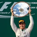 Race winner Nico Rosberg (GER) Mercedes AMG F1 celebrates on the podium with the trophy at Formula One World Championship, Rd1, Australian Grand Prix, Race, Albert Park, Melbourne, Australia, Sunday 20 March 2016. © Sutton Motorsport Images