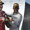 Sebastian Vettel (GER) Ferrari and Nico Rosberg (GER) Mercedes AMG F1 celebrate on the podium with the champagne at Formula One World Championship, Rd1, Australian Grand Prix, Race, Albert Park, Melbourne, Australia, Sunday 20 March 2016. © Sutton Motorsport Images