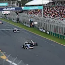 Marcus Ericsson (SWE) Sauber C35 Jenson Button (GBR) McLaren MP4-31 battle and at Formula One World Championship, Rd1, Australian Grand Prix, Race, Albert Park, Melbourne, Australia, Sunday 20 March 2016. © Sutton Motorsport Images