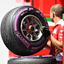 Ferrari mechanic and Pirelli tyre at Formula One World Championship, Rd9, Austrian Grand Prix, Practice, Spielberg, Austria, Friday 1 July 2016. © Sutton Images