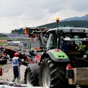 The crashed car of Daniil Kvyat (RUS) Scuderia Toro Rosso is recovered in Q1 at Formula One World Championship, Rd9, Austrian Grand Prix, Qualifying, Spielberg, Austria, Saturday 2 July 2016. © Sutton Images
