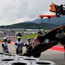 The crashed car of Daniil Kvyat (RUS) Scuderia Toro Rosso is recovered in Q1 at Formula One World Championship, Rd9, Austrian Grand Prix, Qualifying, Spielberg, Austria, Saturday 2 July 2016. © Sutton Images
