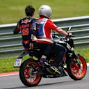 Carlos Sainz (ESP) Scuderia Toro Rosso on a scooter having stopped on track in Q1 at Formula One World Championship, Rd9, Austrian Grand Prix, Qualifying, Spielberg, Austria, Saturday 2 July 2016. © Sutton Images