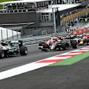 Lewis Hamilton (GBR) Mercedes-Benz F1 W07 Hybrid leads Jenson Button (GBR) McLaren MP4-31 at the start of the race at Formula One World Championship, Rd9, Austrian Grand Prix, Race, Spielberg, Austria, Sunday 3 July 2016. © Sutton Images