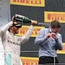 Race winner Lewis Hamilton (GBR) Mercedes AMG F1 celebrates on the podium with James Vowles (GBR) Mercedes AMG F1 Chief Strategist and the champagne at Formula One World Championship, Rd9, Austrian Grand Prix, Race, Spielberg, Austria, Sunday 3 July 2016. © Sutton Images