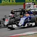 Felipe Nasr (BRA) Sauber C35 and Jenson Button (GBR) McLaren MP4-31 battle at Formula One World Championship, Rd9, Austrian Grand Prix, Race, Spielberg, Austria, Sunday 3 July 2016. © Sutton Images