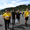 Esteban Ocon (FRA) Renault Sport F1 Team and Kevin Magnussen (DEN) Renault Sport F1 Team walk the track at Formula One World Championship, Rd9, Austrian Grand Prix, Preparations, Spielberg, Austria, Thursday 30 June 2016. © Sutton Images