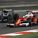 Sebastian Vettel (GER) Ferrari SF16-H and Nico Rosberg (GER) Mercedes-Benz F1 W07 Hybrid at Formula One World Championship, Rd2, Bahrain Grand Prix Practice, Bahrain International Circuit, Sakhir, Bahrain, Friday 1 April 2016. © Sutton Motorsport Images