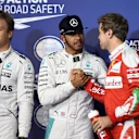 (L to R): Nico Rosberg (GER) Mercedes AMG F1, pole sitter Lewis Hamilton (GBR) Mercedes AMG F1 and Sebastian Vettel (GER) Ferrari celebrate in parc ferme at Formula One World Championship, Rd2, Bahrain Grand Prix Qualifying, Bahrain International Circuit, Sakhir, Bahrain, Saturday 2 April 2016. © Sutton Motorsport Images