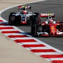 Kimi Raikkonen (FIN) Ferrari SF16-H and Esteban Gutierrez (MEX) Haas VF-16 at Formula One World Championship, Rd2, Bahrain Grand Prix Qualifying, Bahrain International Circuit, Sakhir, Bahrain, Saturday 2 April 2016. © Sutton Motorsport Images