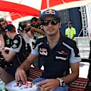 Carlos Sainz (ESP) Scuderia Toro Rosso at the autograph session at Formula One World Championship, Rd2, Bahrain Grand Prix Qualifying, Bahrain International Circuit, Sakhir, Bahrain, Saturday 2 April 2016. © Sutton Motorsport Images