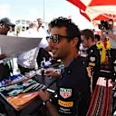 Daniel Ricciardo (AUS) Red Bull Racing at the autograph session at Formula One World Championship, Rd2, Bahrain Grand Prix Qualifying, Bahrain International Circuit, Sakhir, Bahrain, Saturday 2 April 2016. © Sutton Motorsport Images