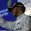 Lewis Hamilton (GBR) Mercedes AMG F1 celebrates on the podium at Formula One World Championship, Rd2, Bahrain Grand Prix Race, Bahrain International Circuit, Sakhir, Bahrain, Sunday 3 April 2016. © Sutton Motorsport Images