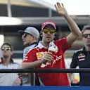 Sebastian Vettel (GER) Ferrari and Daniil Kvyat (RUS) Red Bull Racing on the drivers parade at Formula One World Championship, Rd2, Bahrain Grand Prix Race, Bahrain International Circuit, Sakhir, Bahrain, Sunday 3 April 2016. © Sutton Motorsport Images