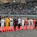 National Anthem on the grid at Formula One World Championship, Rd2, Bahrain Grand Prix Race, Bahrain International Circuit, Sakhir, Bahrain, Sunday 3 April 2016. © Sutton Motorsport Images