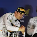 Race winner Nico Rosberg (GER) Mercedes AMG F1 celebrates on the podium with the trophy at Formula One World Championship, Rd2, Bahrain Grand Prix Race, Bahrain International Circuit, Sakhir, Bahrain, Sunday 3 April 2016. © Sutton Motorsport Images