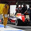 Daniil Kvyat (RUS) Red Bull Racing RB12 is pushed back by the Red Bull Racing mechanics under yellow flag after stopping in pit lane at Formula One Testing, Day Three, Barcelona, Spain, Wednesday 24 February 2016. © Sutton Motorsport Images