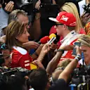 Sebastian Vettel (GER) Ferrari and Kimi Raikkonen (FIN) Ferrari talk with the media at Formula One World Championship, Rd13, Belgian Grand Prix, Practice, Spa Francorchamps, Belgium, Friday 26 August 2016. © Sutton Images