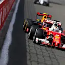 Sebastian Vettel (GER) Ferrari SF16-H and Max Verstappen (NED) Red Bull Racing RB12 battle for position at Formula One World Championship, Rd13, Belgian Grand Prix, Race, Spa Francorchamps, Belgium, Sunday 28 August 2016. © Sutton Images