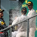 Race winner Nico Rosberg (GER) Mercedes AMG F1 celebrates with the champagne on the podium with Daniel Ricciardo (AUS) Red Bull Racing and Lewis Hamilton (GBR) Mercedes AMG F1 at Formula One World Championship, Rd13, Belgian Grand Prix, Race, Spa Francorchamps, Belgium, Sunday 28 August 2016. © Sutton Images