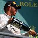 Lewis Hamilton (GBR) Mercedes AMG F1 celebrates on the podium with the champagne at Formula One World Championship, Rd13, Belgian Grand Prix, Race, Spa Francorchamps, Belgium, Sunday 28 August 2016. © Sutton Images