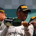 Lewis Hamilton (GBR) Mercedes AMG F1 celebrates on the podium with the champagne  at Formula One World Championship, Rd13, Belgian Grand Prix, Race, Spa Francorchamps, Belgium, Sunday 28 August 2016. © Sutton Images
