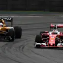 Kevin Magnussen (DEN) Renault Sport F1 Team RS16 and Sebastian Vettel (GER) Ferrari SF16-H at Formula One World Championship, Rd20, Brazilian Grand Prix, Practice, Interlagos, Sao Paulo, Brazil, Friday 11 November 2016. © Sutton Images